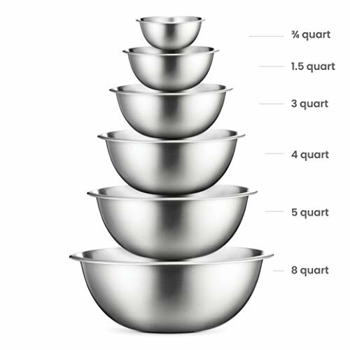 Stacked stainless steel mixing bowls in various sizes.